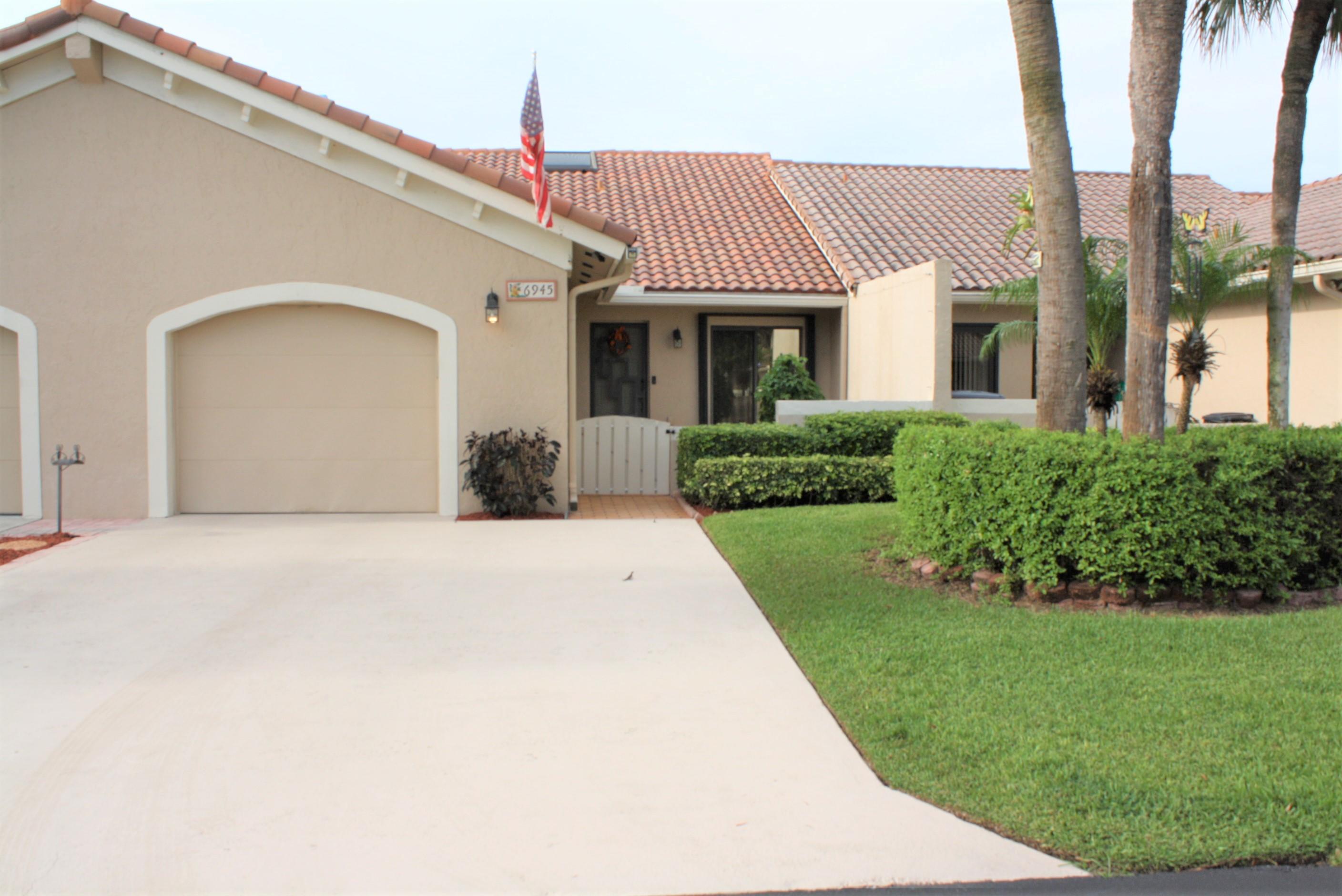 6945 Barbarossa Street Boca Raton, FL 33433 - Photo 1 of 27 FRONT OF HOUSE