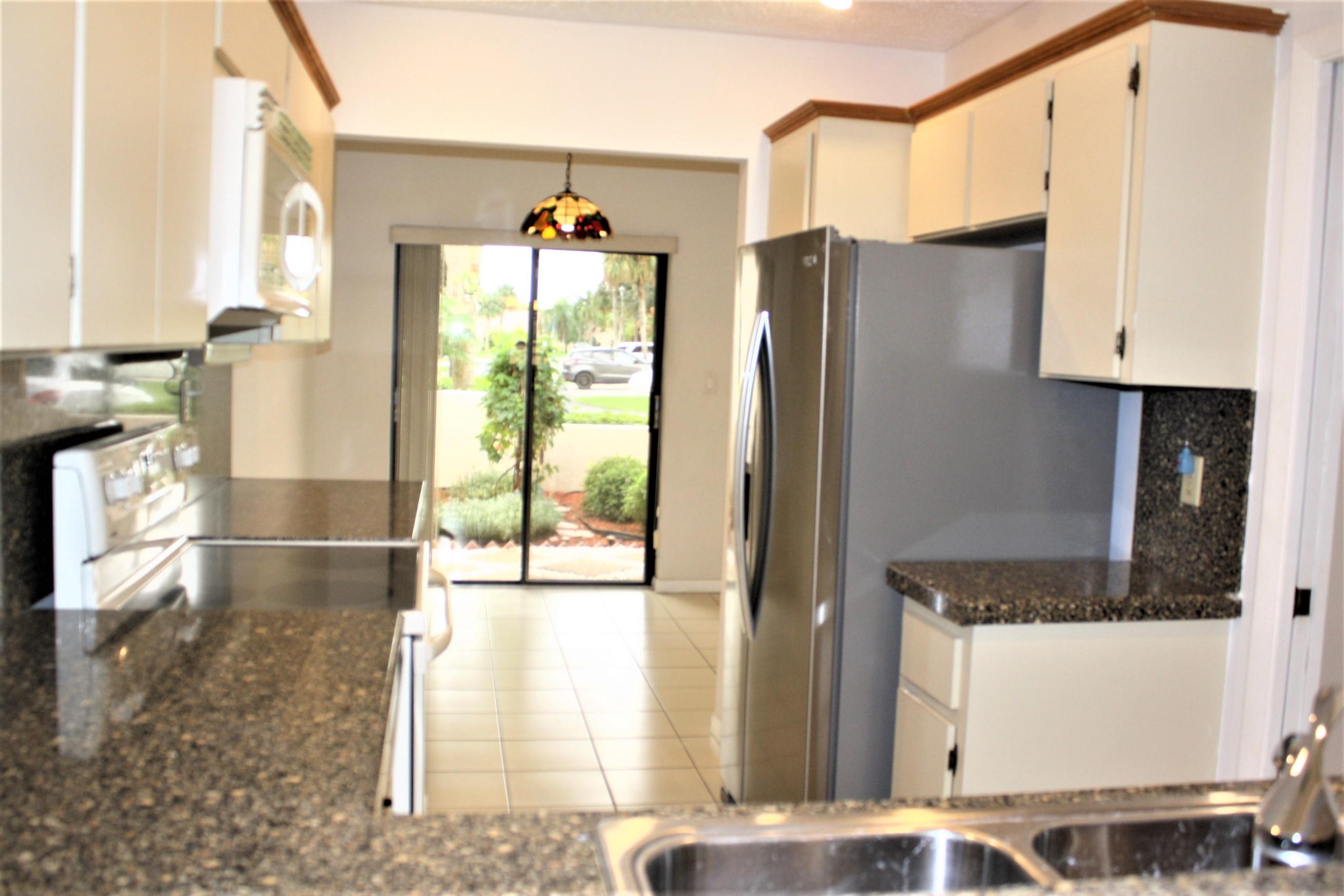 6945 Barbarossa Street Boca Raton, FL 33433 - Photo 8 of 27 KITCHEN
