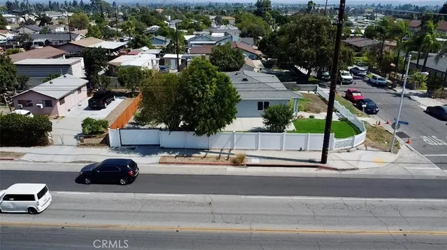 with cars parked in front of a building