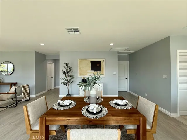 a view of a dining room with furniture