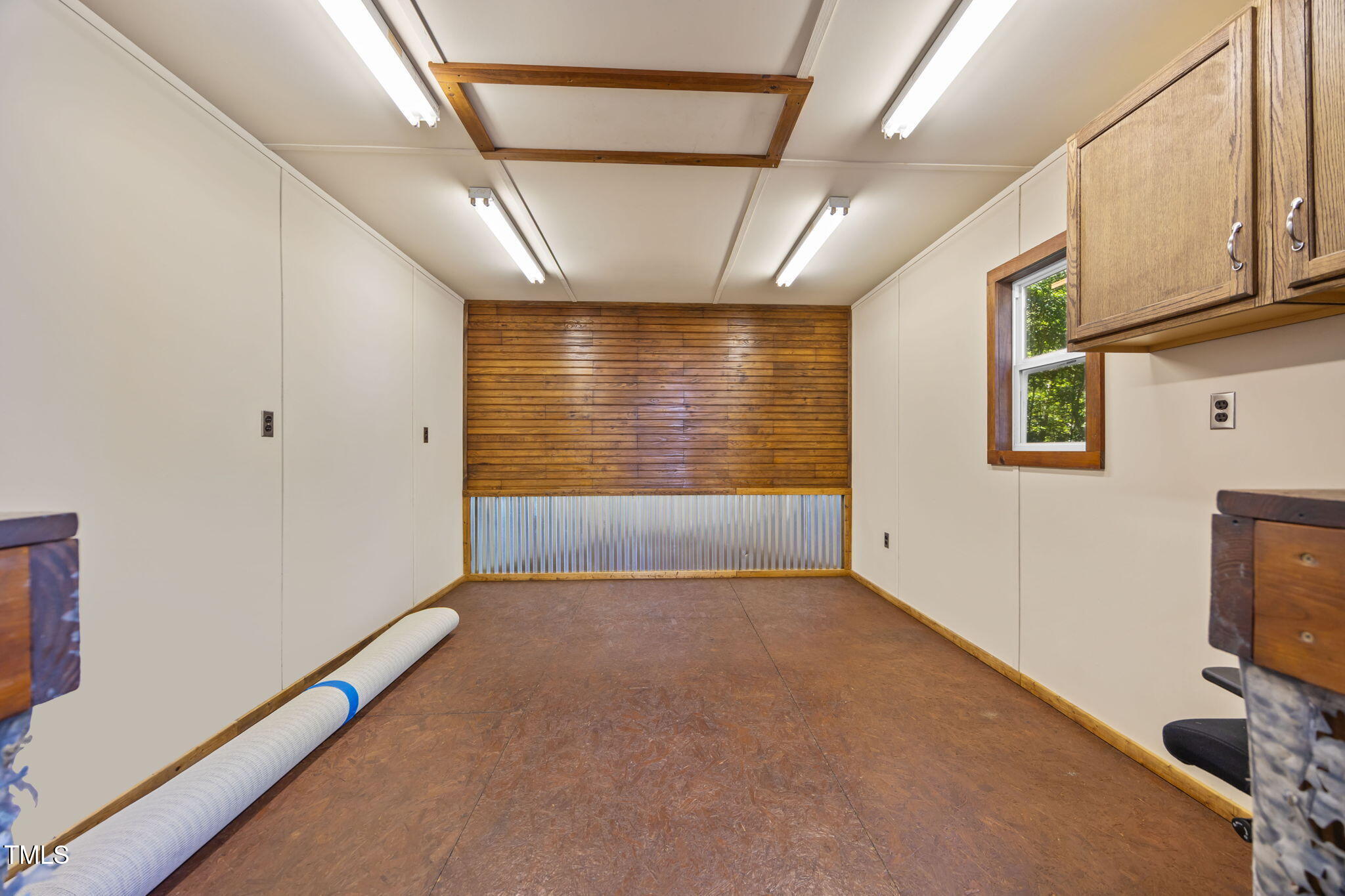 2819 John Lewis Road Burlington, NC 27217 - Photo 31 of 40 Immaculate interior of wired shed/workshop.