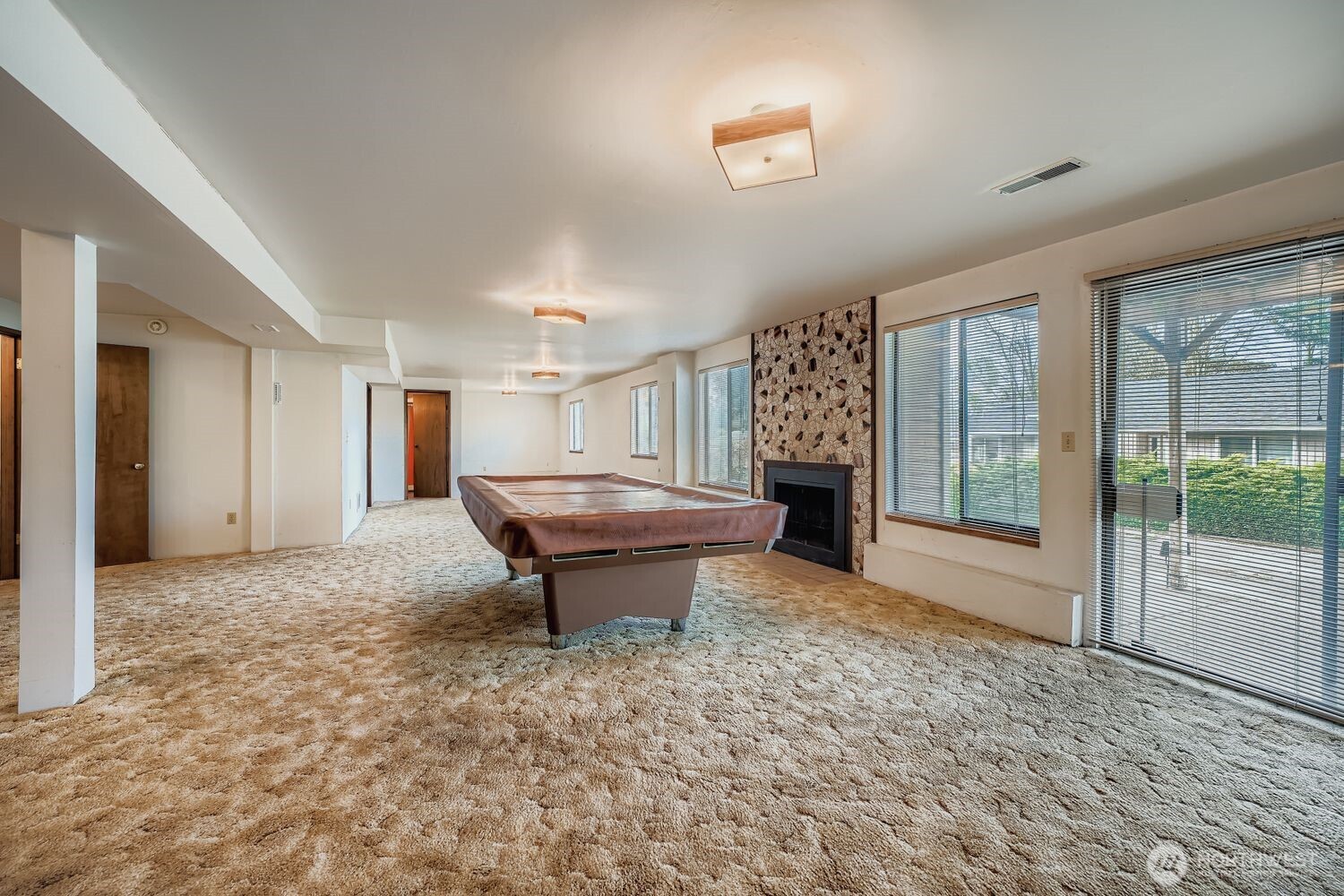 11047 26th Avenue Southwest Seattle, WA 98146 - Photo 14 of 23 a view of a livingroom with furniture window and outside view