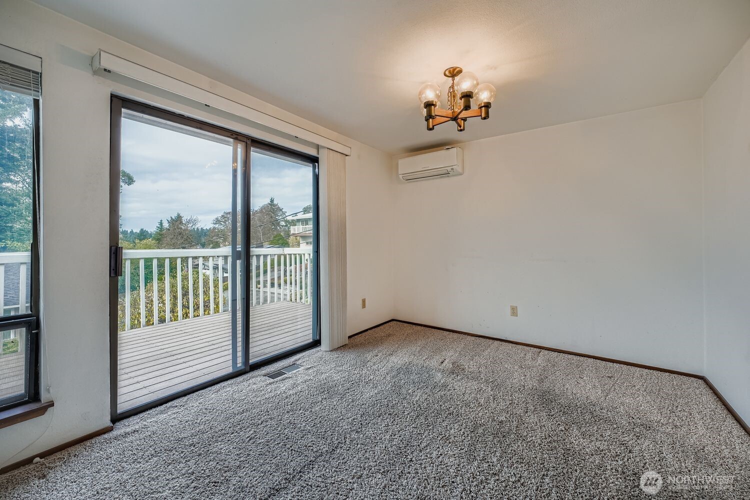 11047 26th Avenue Southwest Seattle, WA 98146 - Photo 6 of 23 a view of an empty room with a window