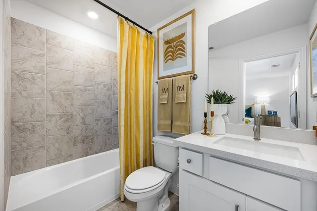 a view of a swimming pool with lawn chairs