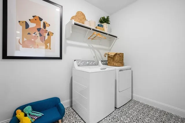 a view of a lake with houses in the back