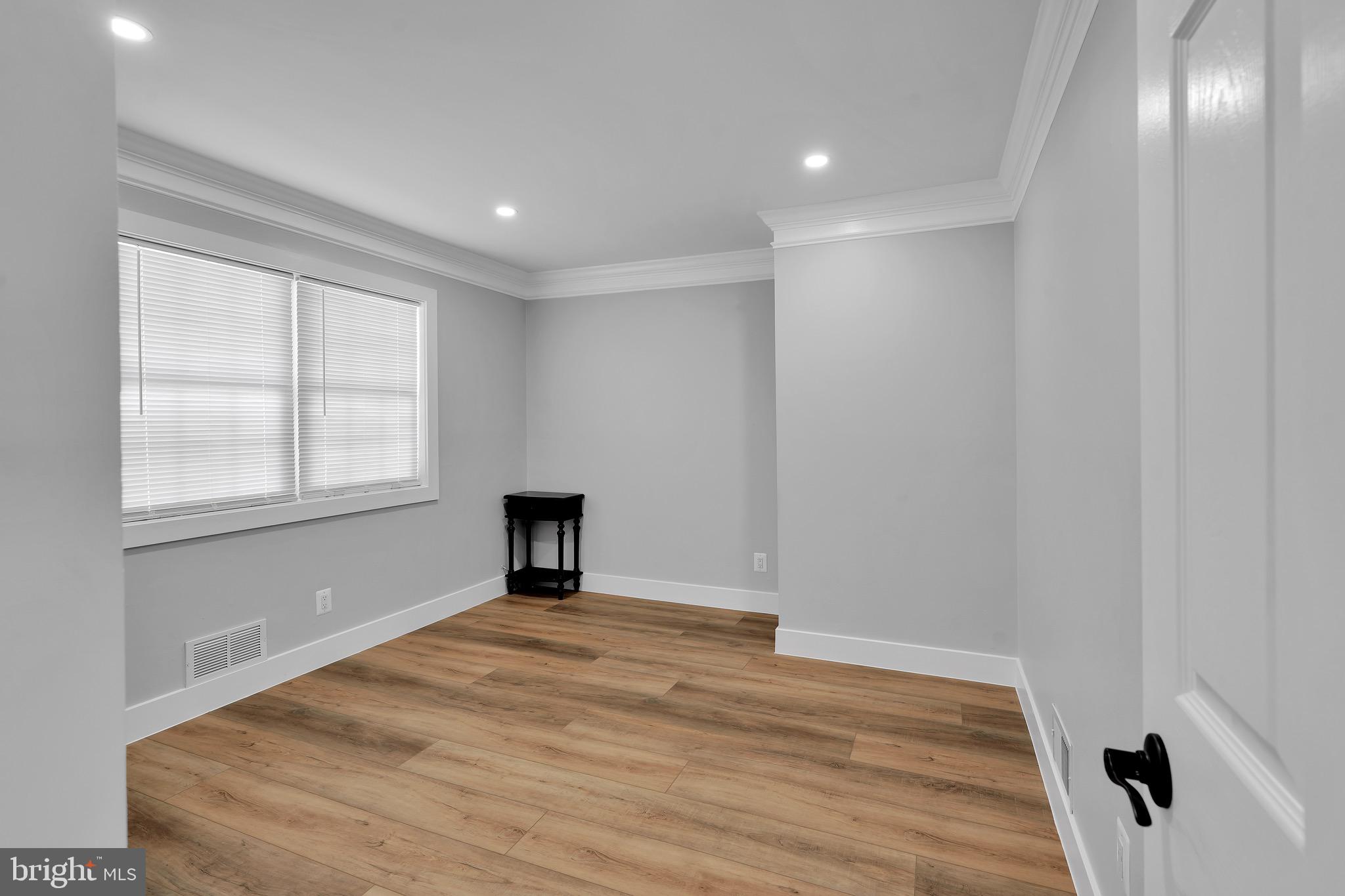 9305 4th Street Lanham, MD 20706 - Photo 20 of 45 a view of empty room with wooden floor