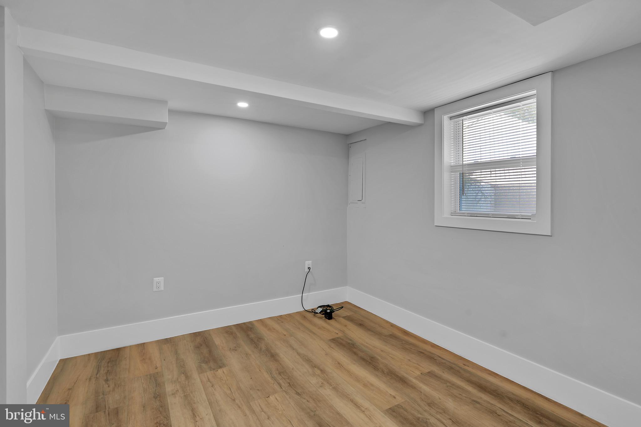 9305 4th Street Lanham, MD 20706 - Photo 32 of 45 a view of a room with wooden floor and windows