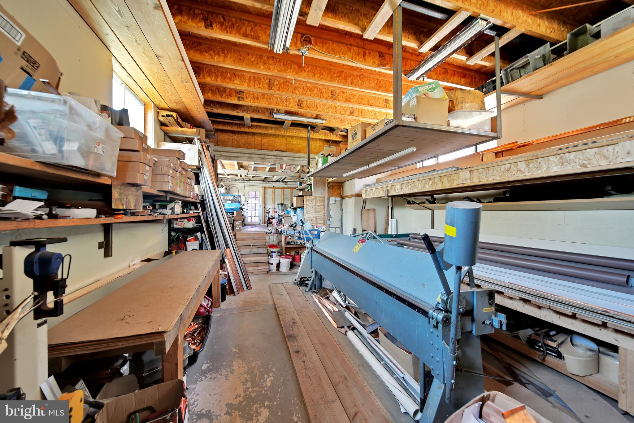 9305 4th Street Lanham, MD 20706 - Photo 37 of 45 a view of a patio with table and chairs