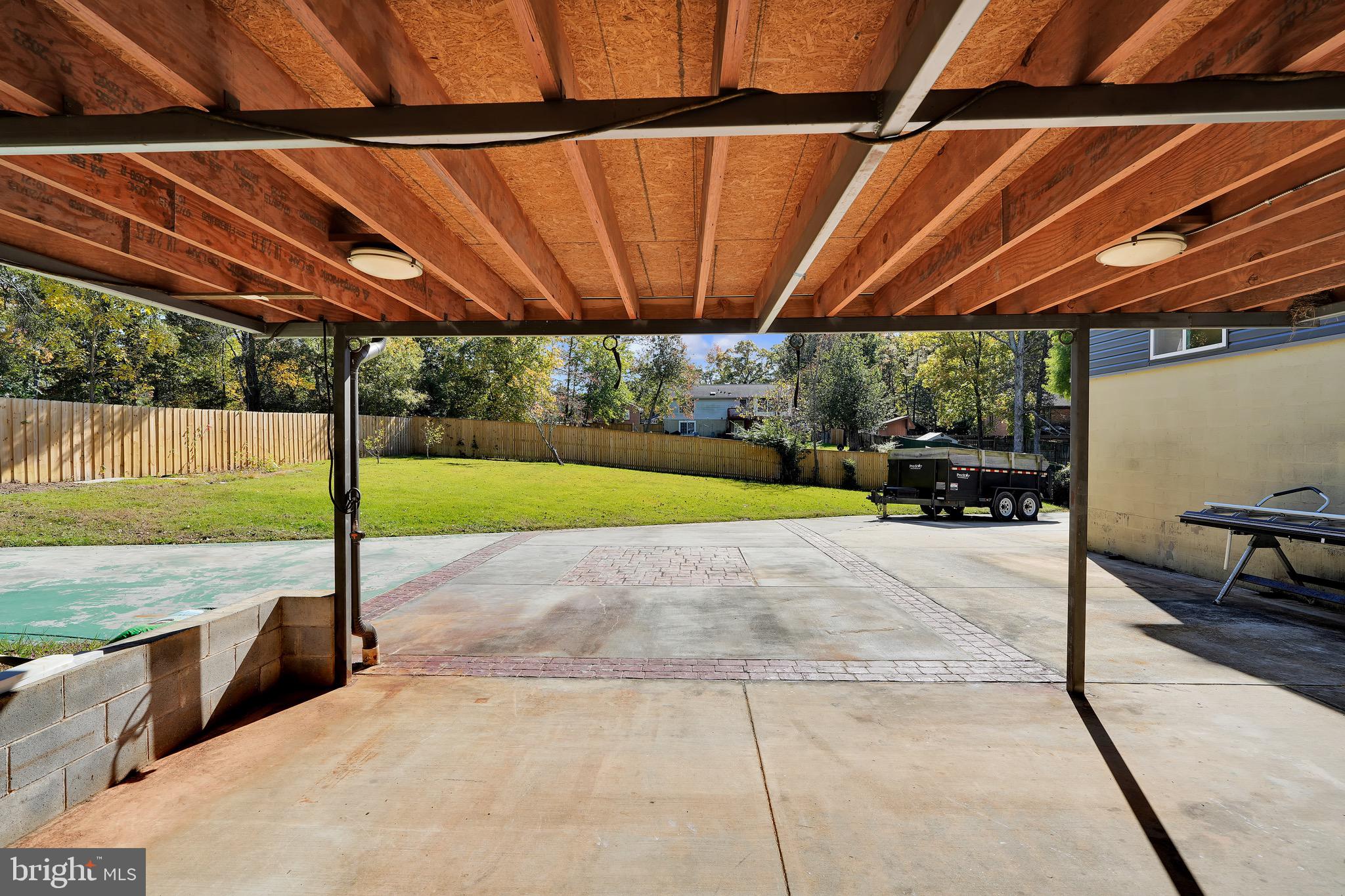 9305 4th Street Lanham, MD 20706 - Photo 40 of 45 a view of a backyard with swimming area