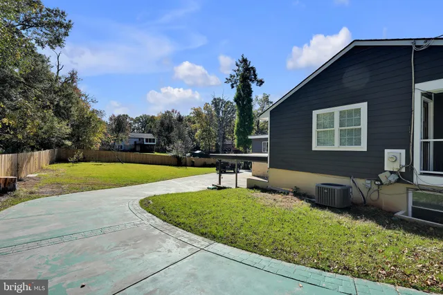 a picture of a wall with a white bed