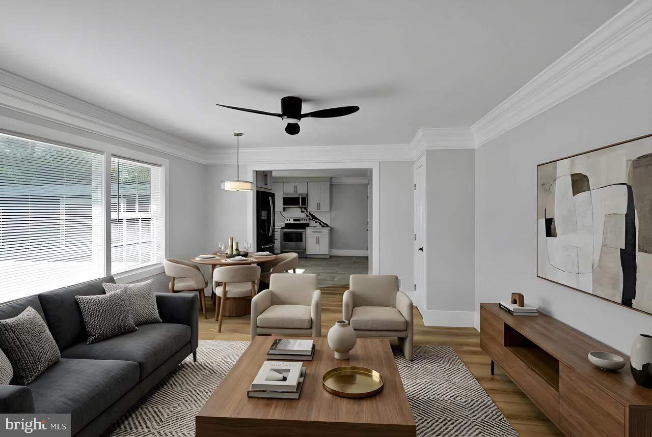 9305 4th Street Lanham, MD 20706 - Photo 5 of 45 a living room with furniture and a window