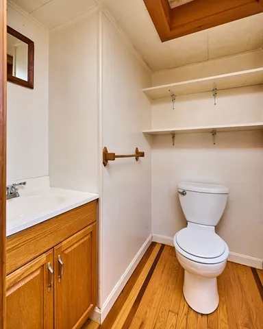 a bathroom with a toilet and a sink