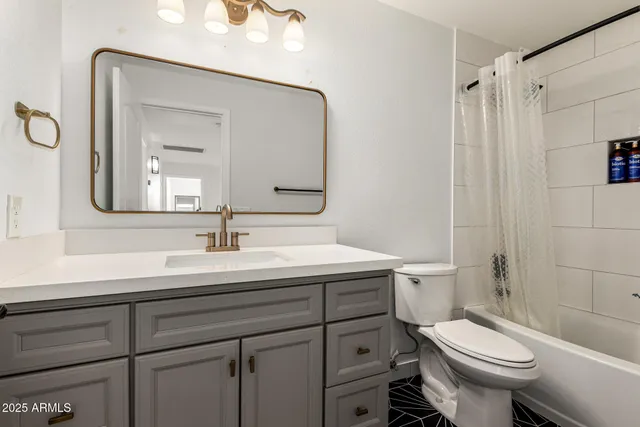 a view of storage and utility room with washer and dryer