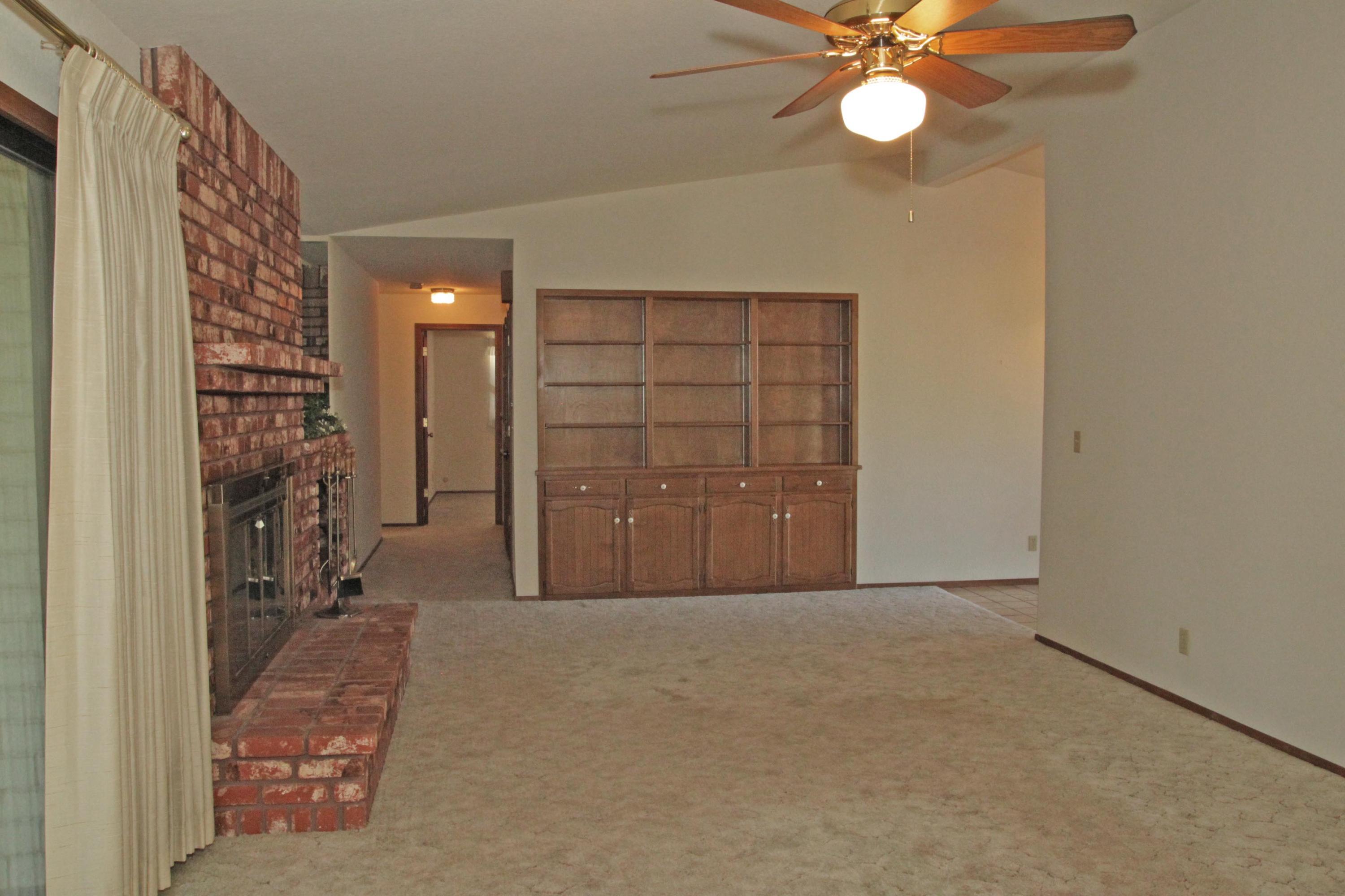 5589 Trish Court Redding, CA 96003 - Photo 10 of 20 a view of empty room with a ceiling fan