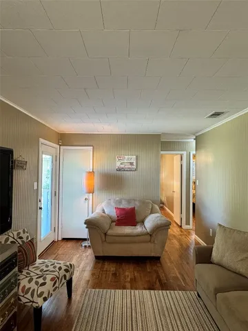 a bedroom with furniture and a couch