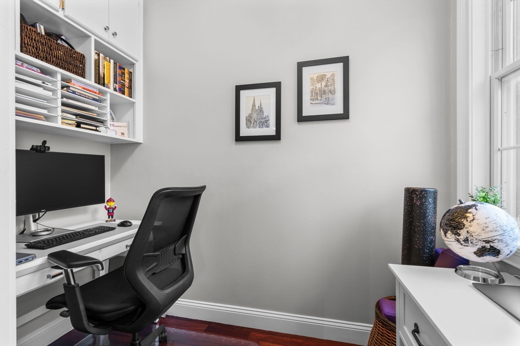 34 H Street, Unit 2L Boston, MA 02127 - Photo 6 of 20 a view of a workspace with furniture and a window