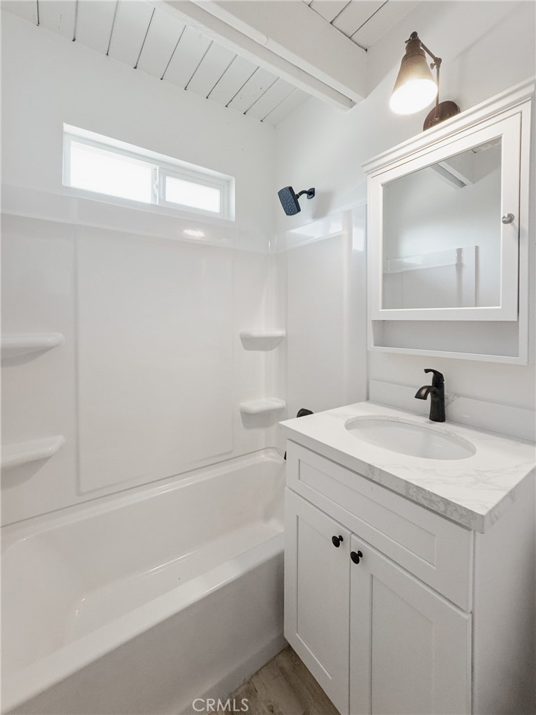 528 Creston Road Paso Robles, CA 93446 - Photo 35 of 46 a bathroom with a sink a vanity and a mirror