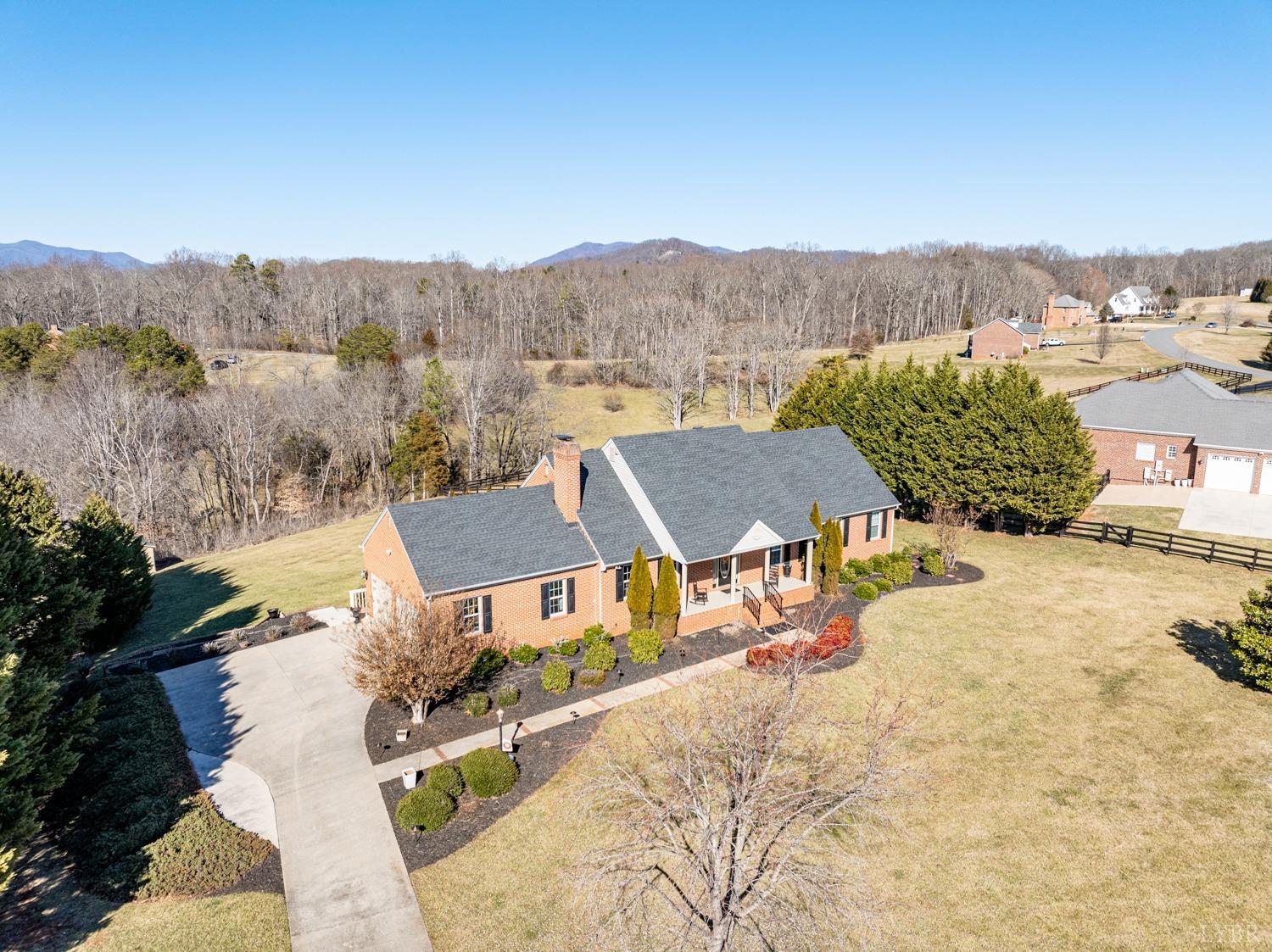 325 Longhill Road Goode, VA 24556 - Photo 4 of 71 an aerial view of a house
