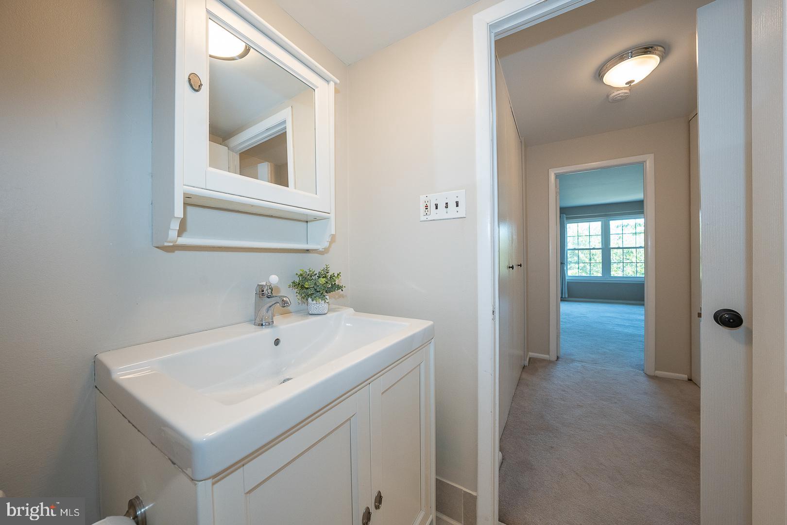 103 Drummers Lane Wayne, PA 19087 - Photo 14 of 24 a bathroom with a sink and a mirror