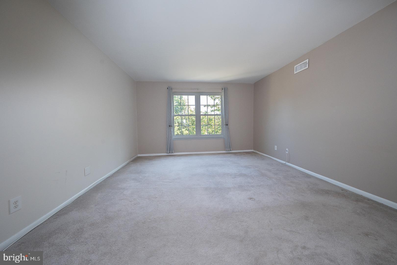 103 Drummers Lane Wayne, PA 19087 - Photo 17 of 24 an empty room with windows