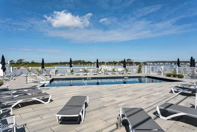 a view of a terrace with seating area