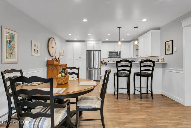 a view of a dining room with furniture