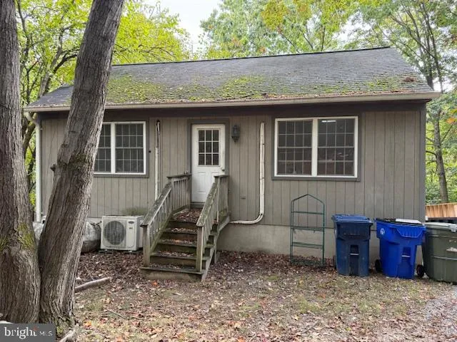 a front view of a house with entryway