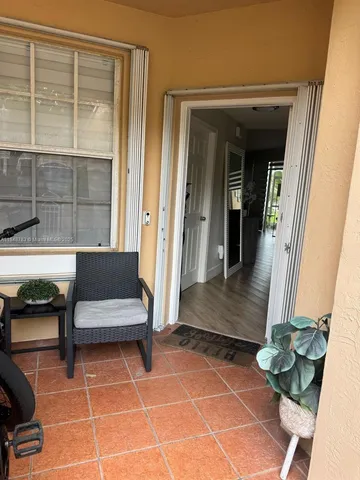 a front view of a house with outdoor space