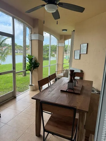 a living room with patio garden
