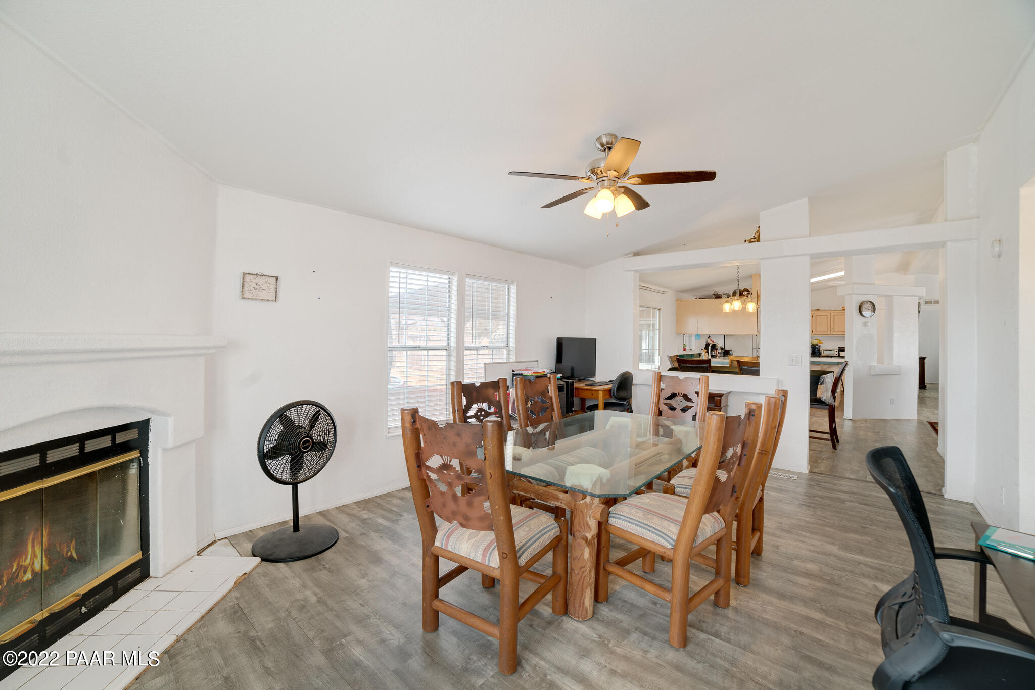 1850 West Big Sky Ranch Road Paulden, AZ 86334 - Photo 10 of 23 a view of a dining room with furniture window and wooden floor