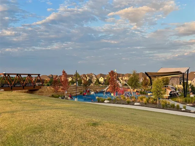 a view of swimming pool with outdoor seating