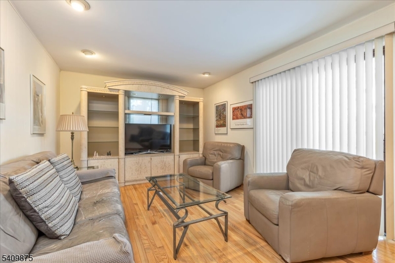29 Manitou Circle Westfield, NJ 07090 - Photo 21 of 35 a living room with furniture and a flat screen tv