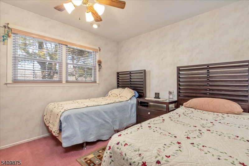 29 Manitou Circle Westfield, NJ 07090 - Photo 27 of 35 a bedroom with two beds and a window