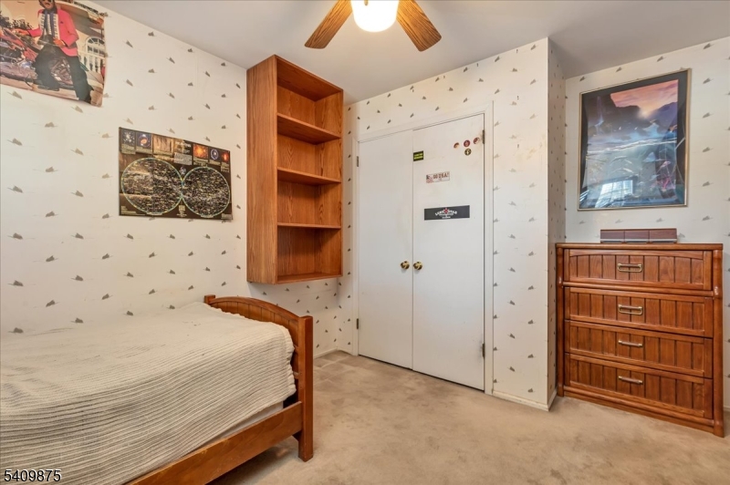 29 Manitou Circle Westfield, NJ 07090 - Photo 32 of 35 a bedroom with a bed and a cabinets