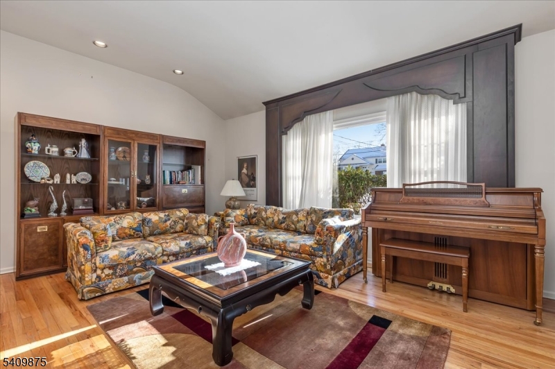 29 Manitou Circle Westfield, NJ 07090 - Photo 6 of 35 a living room with furniture and a fireplace