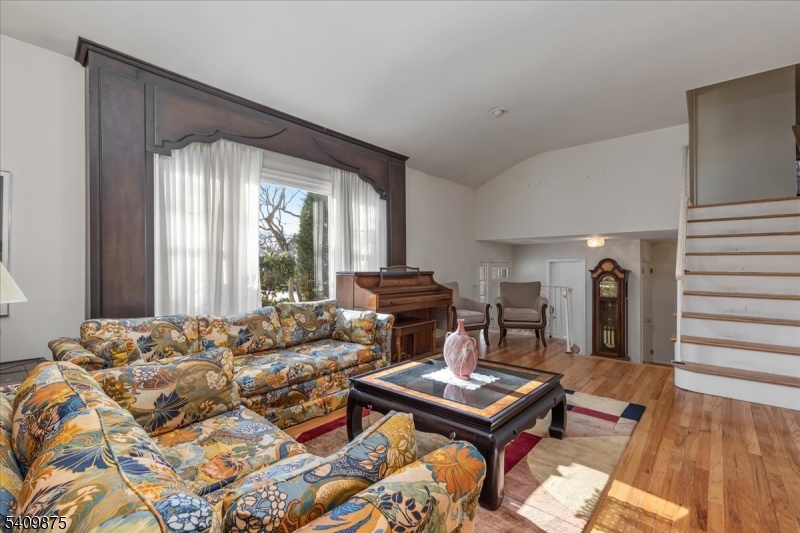 29 Manitou Circle Westfield, NJ 07090 - Photo 7 of 35 a living room with a couch and a table