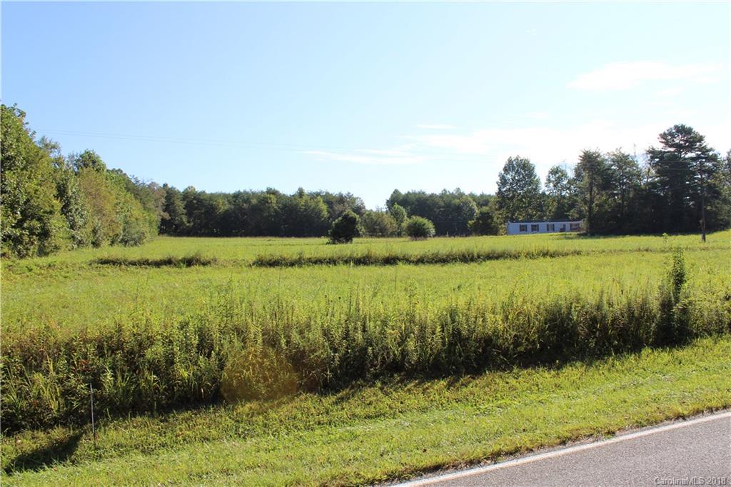1237 Bill Collins Road Columbus, NC 28722 - Photo 3 of 16 a view of a lake with a yard