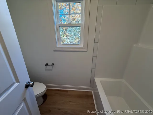 a bathroom with sink and window