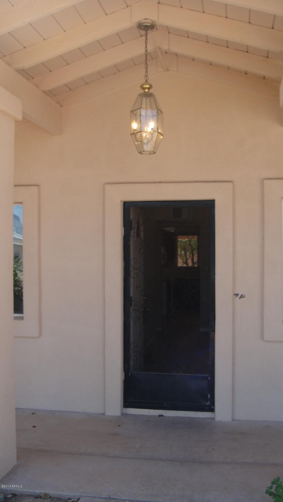 1245 West Elna Rae Street Tempe, AZ 85281 - Photo 7 of 43 a view of a hallway with a small space