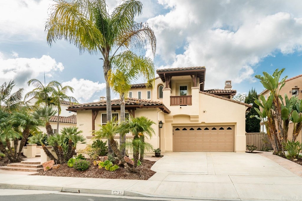 6237 Paseo Privado Carlsbad, CA 92009 - Photo 2 of 29 a view of a house with a patio