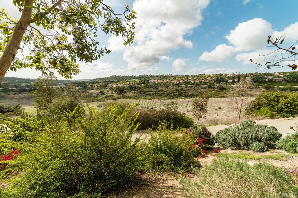 6237 Paseo Privado Carlsbad, CA 92009 - Photo 23 of 29 a view of a lake with houses in the back