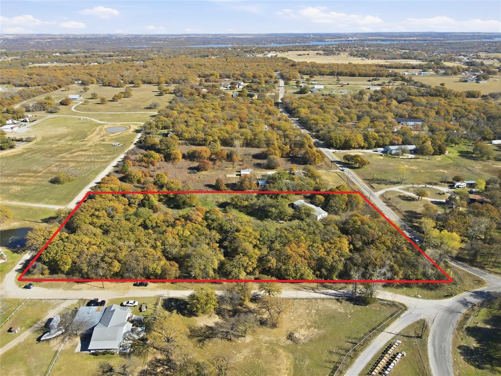 113 County Road 4860 Azle, TX 76020 - Photo 2 of 6 an aerial view of residential houses with outdoor space