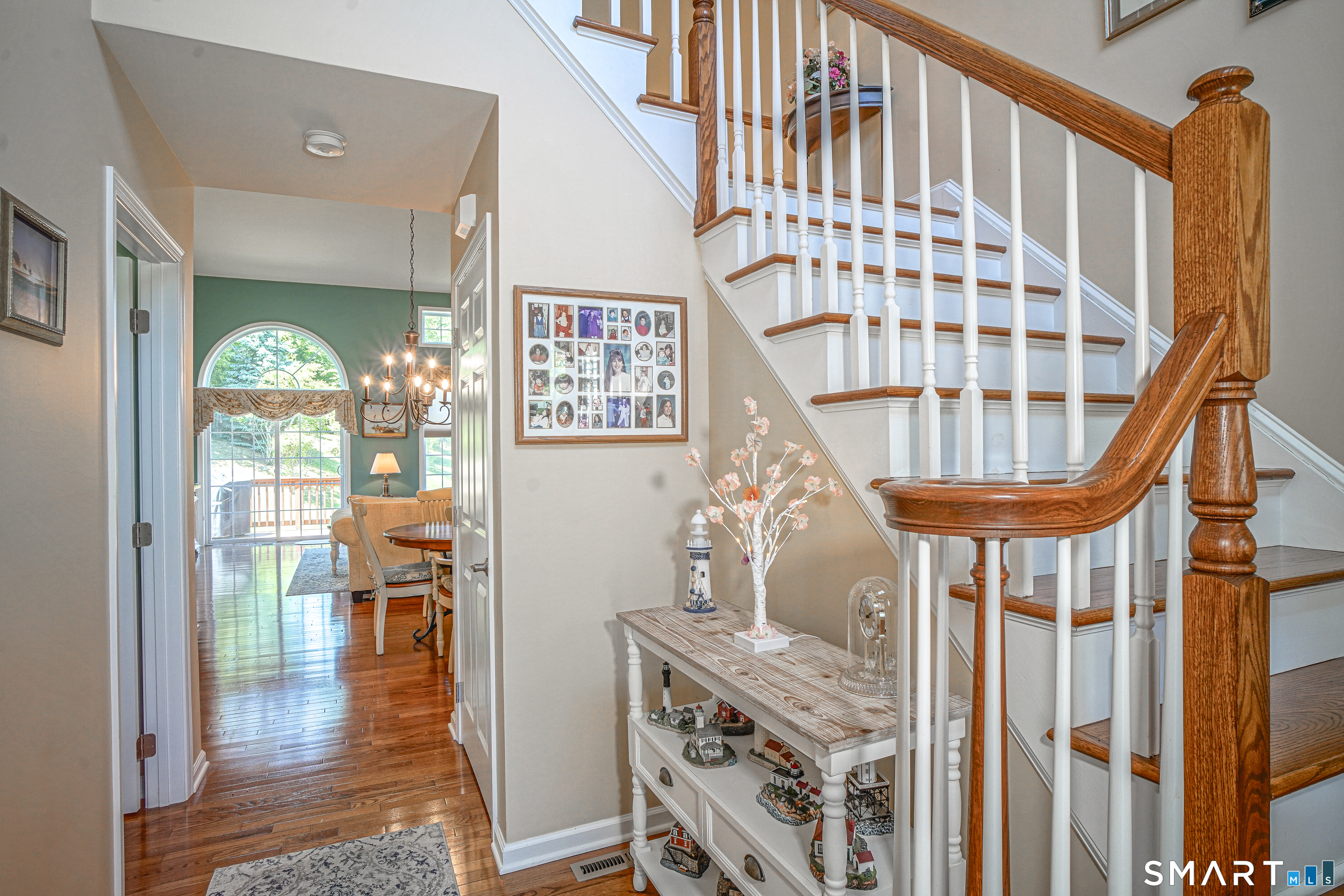 6 Lilac Lane, Unit 6 Prospect, CT 06712 - Photo 20 of 40 Open stairway in the main entry with views of the 2nd level.