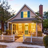 a front view of a house with a porch