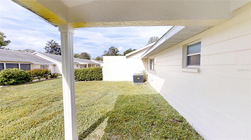 8678 Southwest 95 Street, Unit B Ocala, FL 34481 - Photo 12 of 22 a view of a backyard