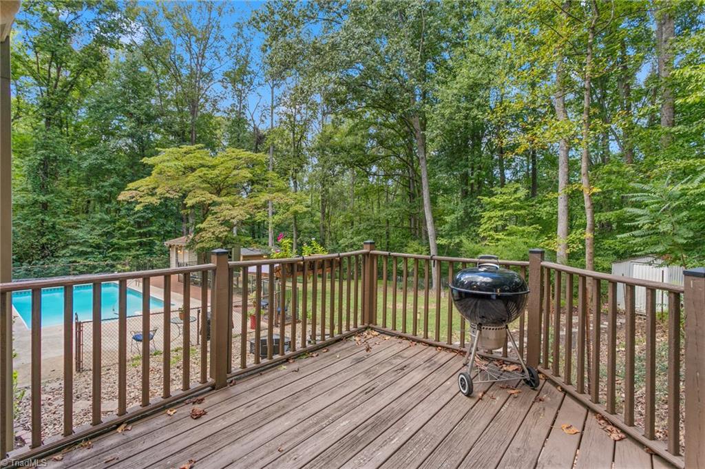 7206 Haw Ridge Road Summerfield, NC 27358 - Photo 39 of 49 Grilling deck overlooking serene backyard oasis