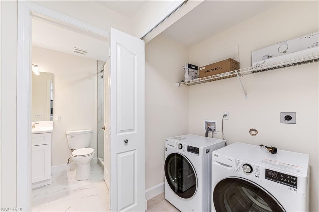 8562 Mustang Drive, Unit 31 Naples, FL 34113 - Photo 25 of 44 Clothes washing area with baseboards, visible vents, laundry area, and independent washer and dryer