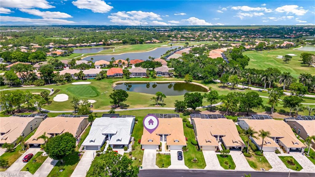 8562 Mustang Drive, Unit 31 Naples, FL 34113 - Photo 32 of 44 Drone / aerial view with view of golf course, a water view, and a residential view