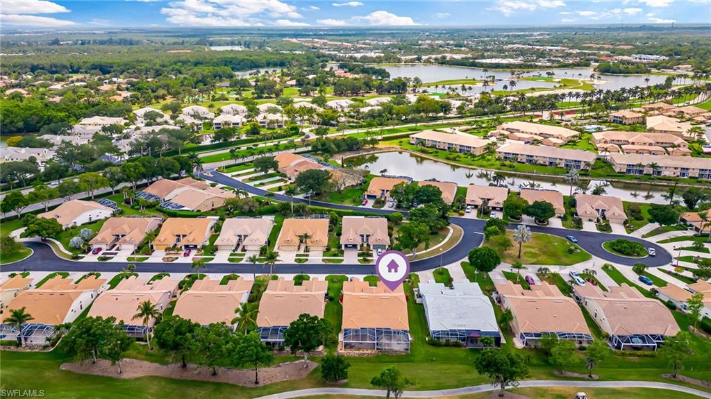 8562 Mustang Drive, Unit 31 Naples, FL 34113 - Photo 40 of 44 Bird's eye view with a water view and a residential view