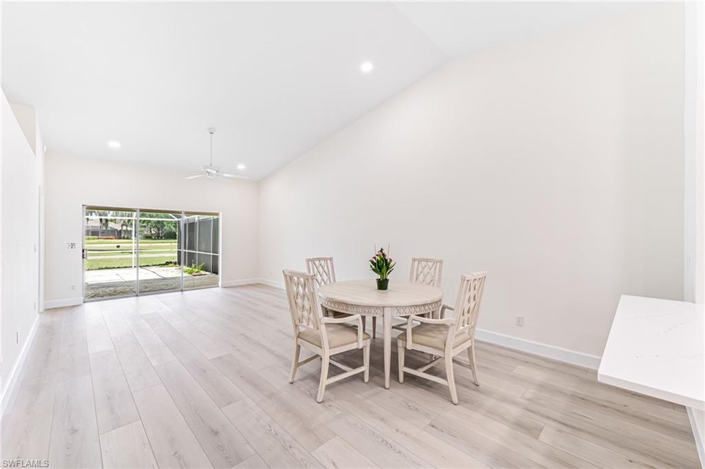 8562 Mustang Drive, Unit 31 Naples, FL 34113 - Photo 8 of 44 Dining area featuring baseboards, recessed lighting, and light wood-style floors